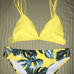 Brand new only been tried on. Yellow swim suit!